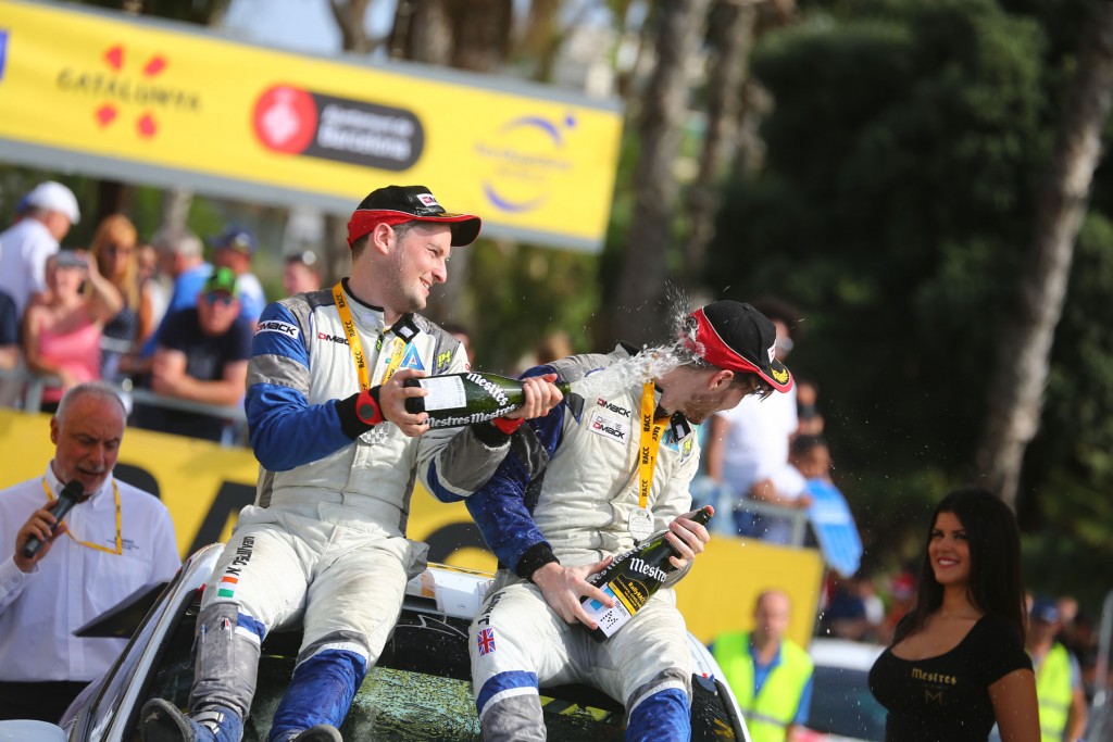 Jon & Niall enjoying a well earned and long overdue spraying of bubbly -WRC Spain (SPA) - WRC 13/10/2016 to 16/10/2016 - PHOTO : @World