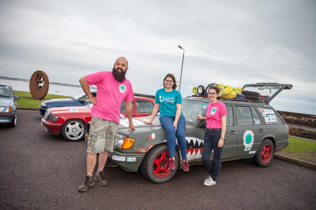 Organisers Stewart Rea and Melissa Dunn with Cancer Focus NI’s Community Fundraising Officer Lianne Mulholland (centre) at the rally’s start point of Burr Point, Ballyhalbert this morning (Friday 25), mainland Ireland’s most easterly point.