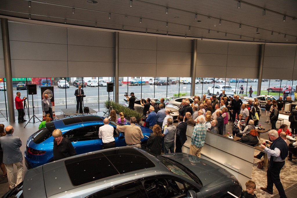 Large crowds gathered in Porsche Belfast at the opening of Titanic Déjà vu Ulster...