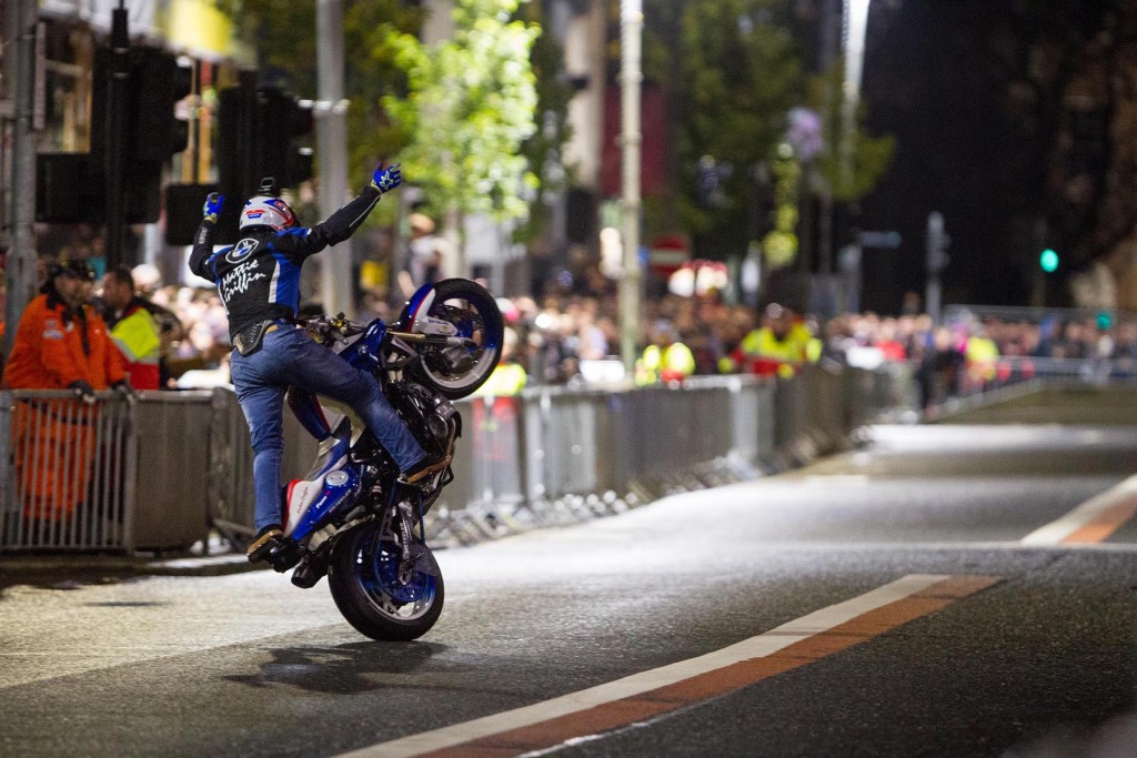 Galway stunt rider Mattie Griffin defying the laws of physics aboard his BMW motorcycle on the streets of Belfast City Centre during the Red Bull Racing Formula One display...