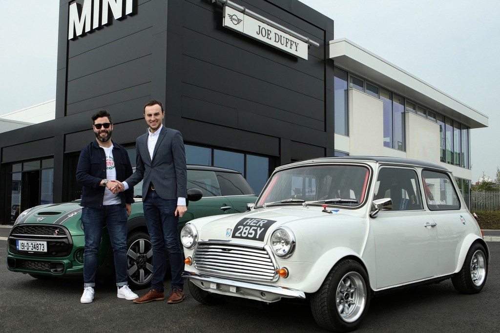 From left Austin Behan, General Manager for MINI Ireland and William Neill, MINI Magic Event Director shake hands on the sponsorship of the September 15 track day and meet open to road, rally and track MINIS, taking place at White River Park, Collon, County Louth. 