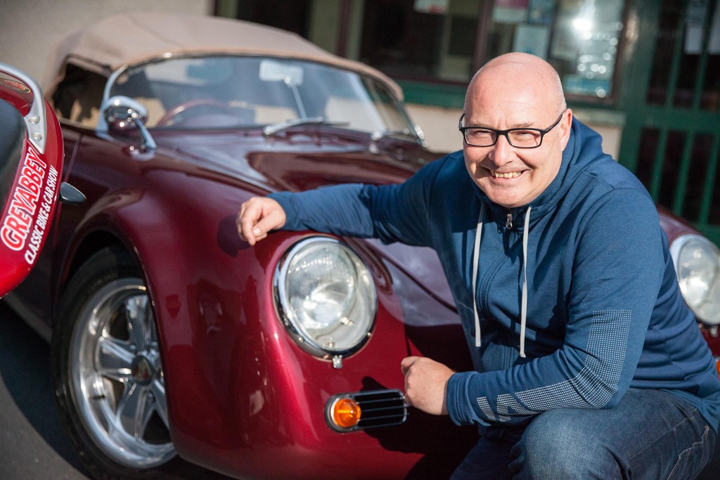 Show organiser, Paul Taggart, in a classic Porsche at Greyabbey Village Hall at the launch of this year's Classic Bike & Car Show, set to he held at the venue on Saturday 24 August...